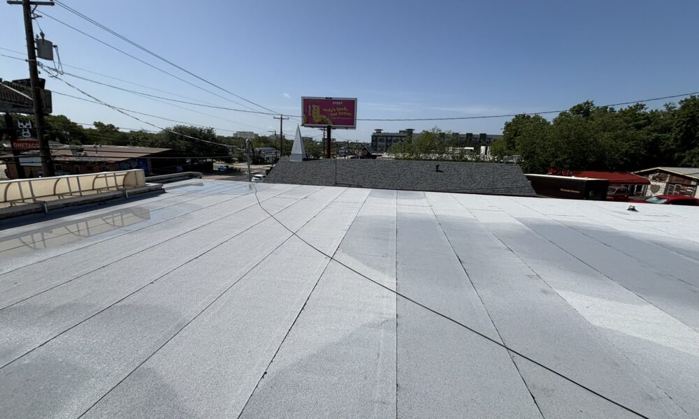 Close-up of durable multi-layer Modified Bitumen system on a low-slope commercial roof