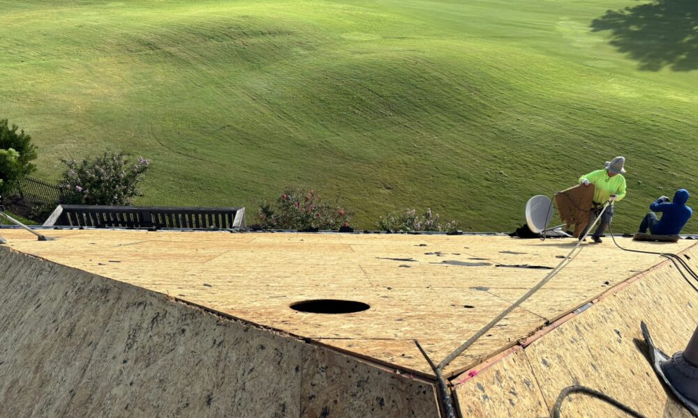 Studio 23 residential roofing contractor crew installing shingles on a roof in the Round Rock area